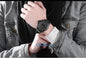 Alcom Distribution tactical luminous army watch black rugged wristwatch worn on model wearing denim jacket