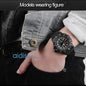 Alcom Distribution tactical luminous army watch black rugged dial on wrist with black silicone strap and denim jacket sleeve
