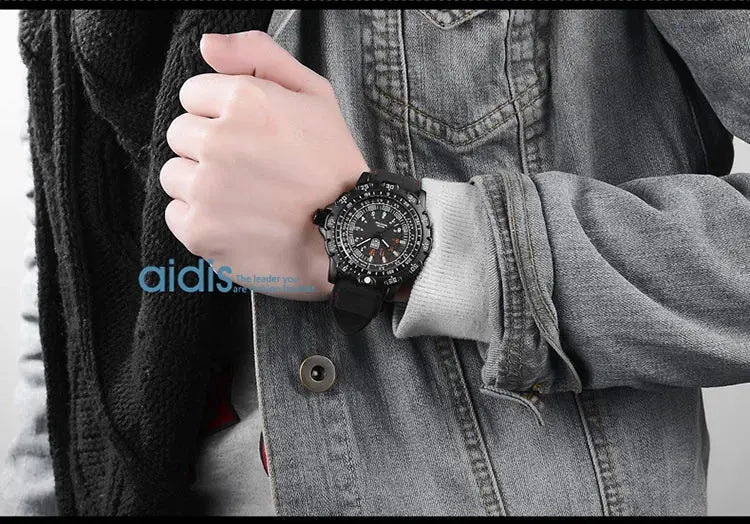 Alcom Distribution tactical luminous army watch worn on wrist over gray denim jacket showing rugged black design