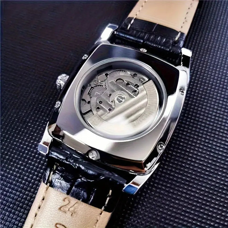Alcom Distribution men's mechanical square watch showing silver case and visible gears with black leather strap