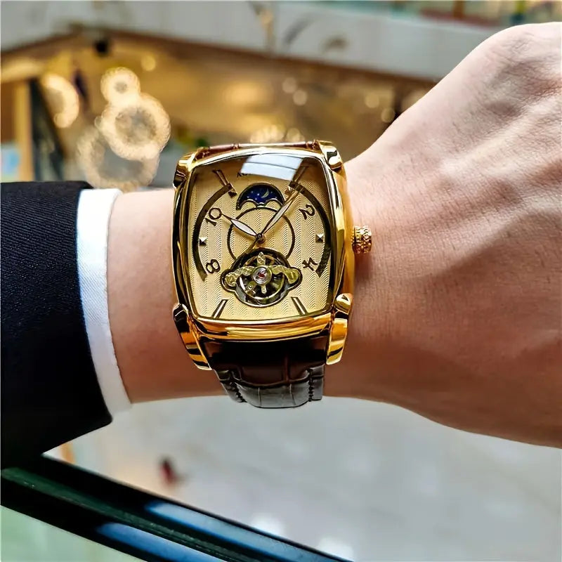 Alcom Distribution men's mechanical square watch with gold case and black leather strap on wrist