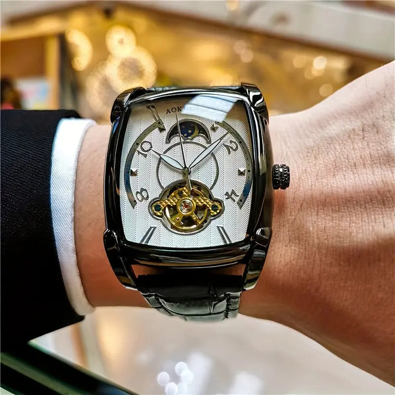 Durable men's wristwatch by Alcom Distribution with black leather strap and rectangular silver dial
