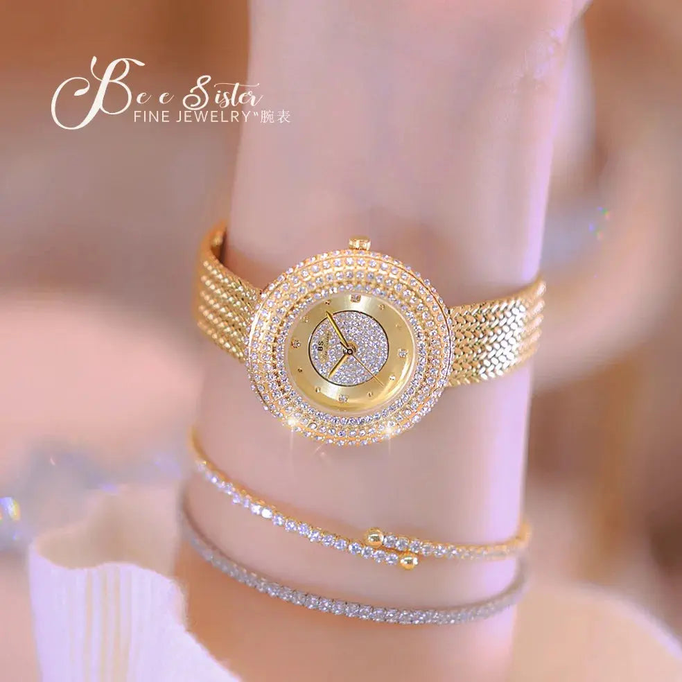 Alcom Distribution gold jeweled bracelet watch closeup of hot-selling ladies quartz watch with mesh band