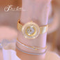 Alcom Distribution gold jeweled bracelet watch closeup of hot-selling ladies quartz watch with mesh band