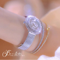 Alcom Distribution hot-selling ladies quartz watch with crystal encrusted round dial and silver mesh bracelet on wrist