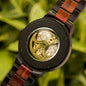 BOBO BIRD men's mechanical wood watch with visible gold gears and dark wooden strap by Alcom Distribution