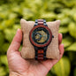 BOBO BIRD men's mechanical wood watch with visible gears and wooden link band held on cushion