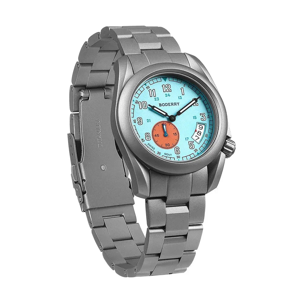 Alcom Distribution titanium adventure watch with silver metal band and blue dial with orange subdial