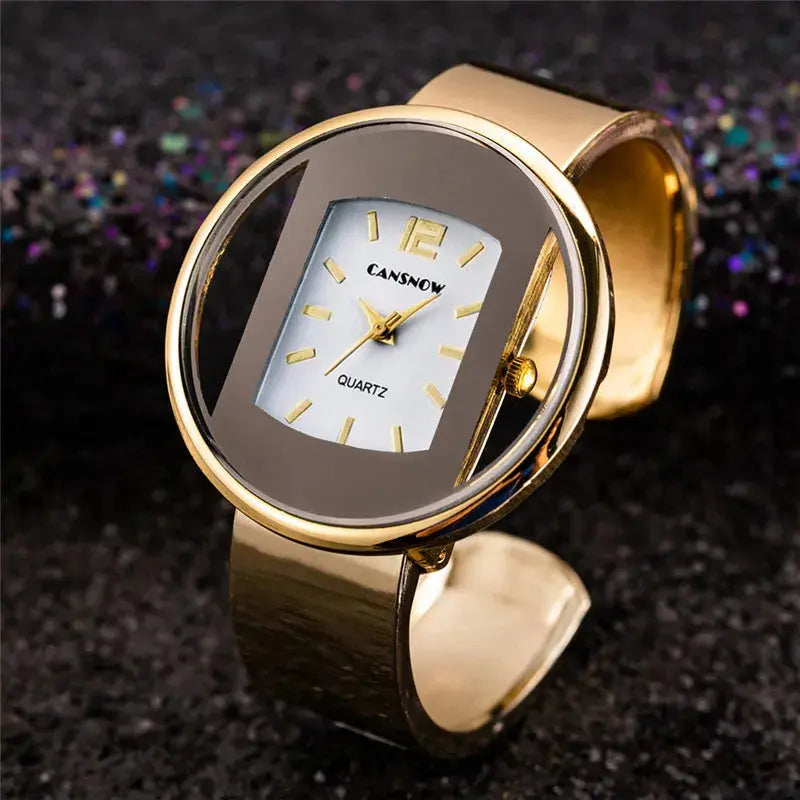 Alcom Distribution women's elegant quartz watch with gold-tone band and unique transparent dial design