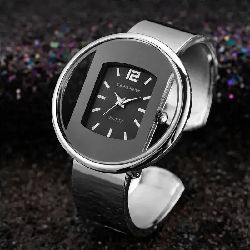 Alcom Distribution women's elegant quartz watch with black rectangular dial and silver band