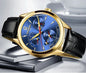 CARNIVAL men's automatic watch gold case blue sunburst dial with three subdials and black leather strap