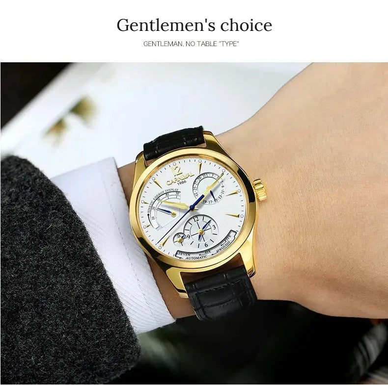 CARNIVAL men's automatic watch gold case white dial blue hands black leather strap on wrist by Alcom Distribution