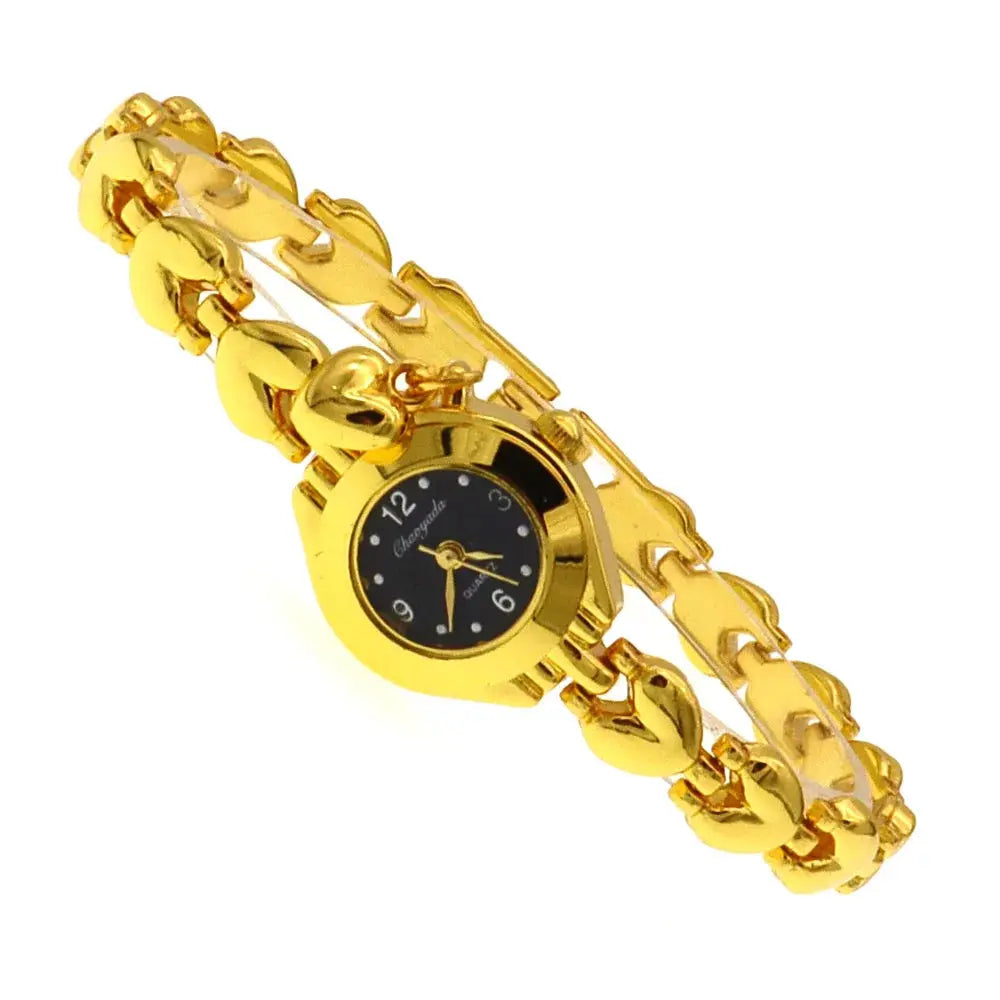 Alcom Distribution gold bracelet watch for women with black dial and elegant link design