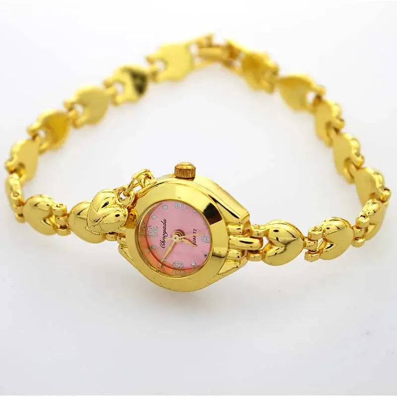 Gold bracelet watch for women with heart-shaped links and pink dial by Alcom Distribution