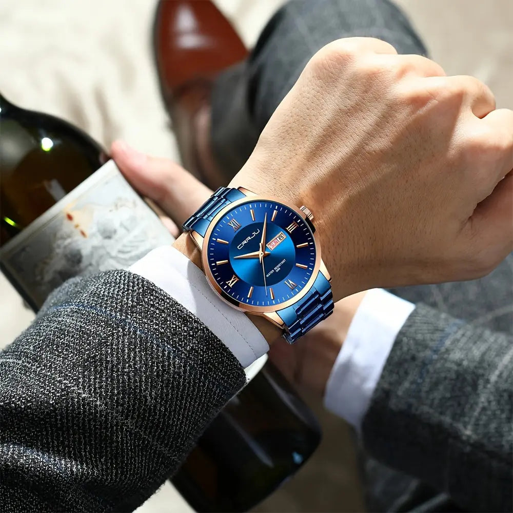 Alcom Distribution men's classic quartz watch with blue dial and metal strap on wrist