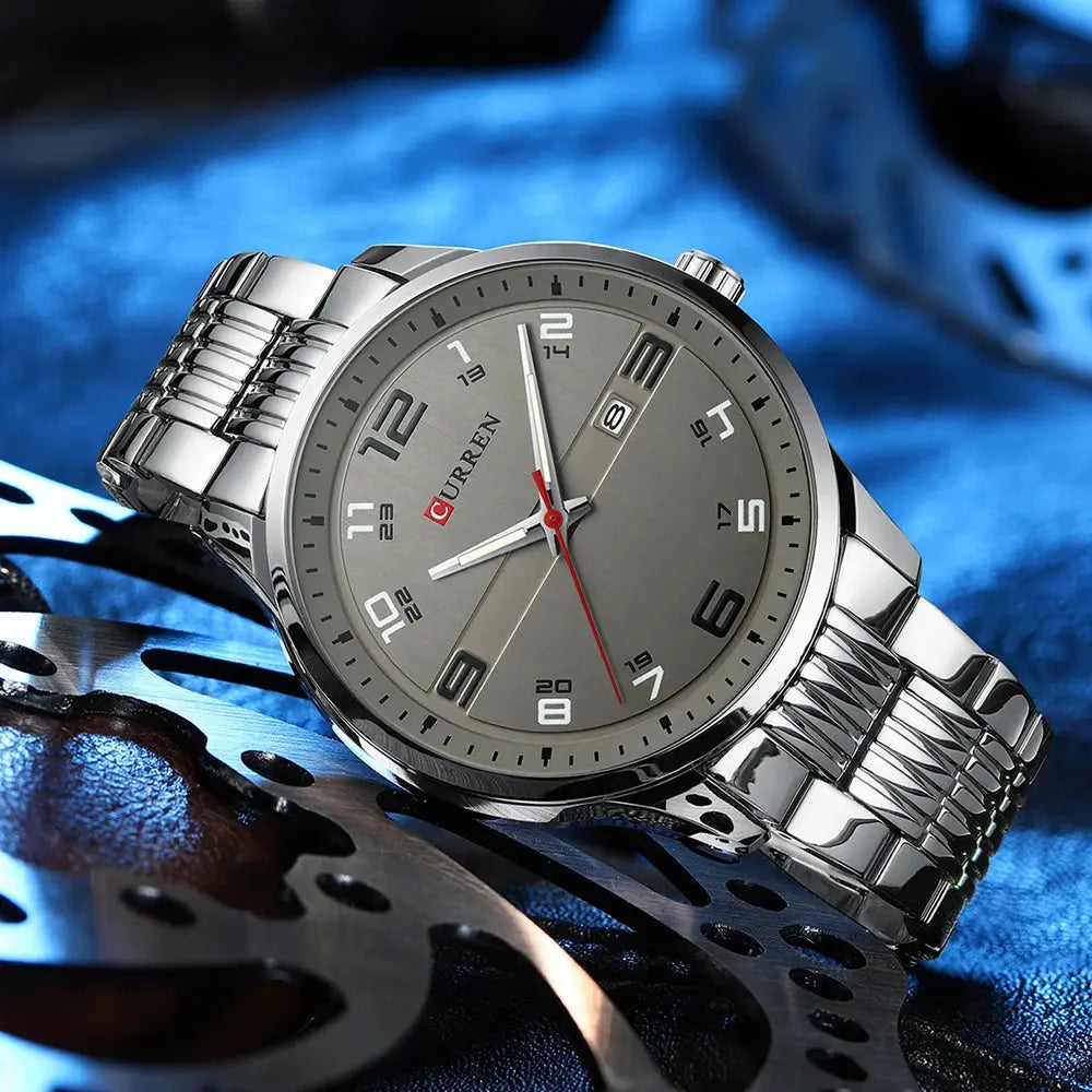 Alcom Distribution stainless steel business watch with silver band and gray dial