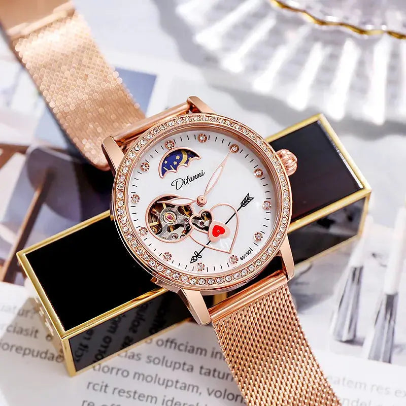 Alcom Distribution women's luxury automatic watch with rose gold mesh band and decorative dial