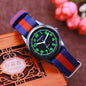 Alcom Distribution digital watches for boys and girls with black face and green numbers on blue and red striped strap
