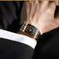 Alcom Distribution luxury men's quartz watch with rectangular black dial rose gold bezel and black bracelet