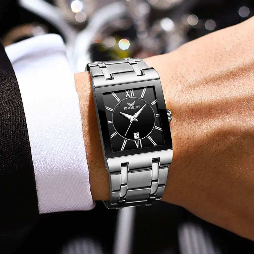 Alcom Distribution stainless steel rectangular watch on wrist with black dial and Roman numerals luxury men's quartz watch