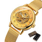 Elegant mechanical timepiece for women with gold mesh band and visible gears by Alcom Distribution