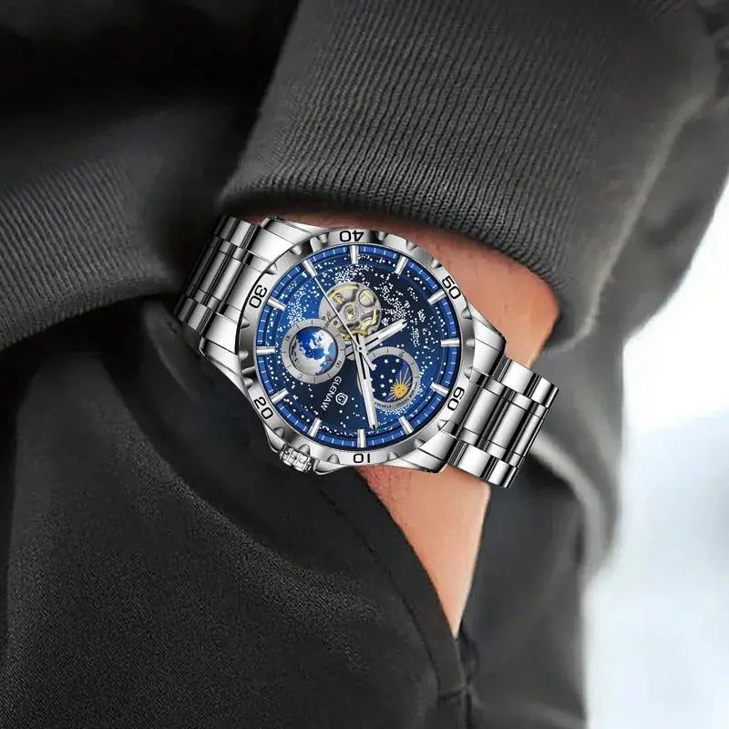 Glenaw rotating earth watch with silver band and blue starry dial worn on wrist by Alcom Distribution
