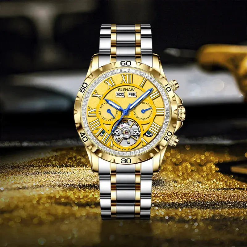 Stylish men's wristwatch with gold and silver metal band and detailed yellow dial by Alcom Distribution