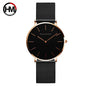 Hannah Martin rose gold watch with black mesh strap and minimalist black dial from Alcom Distribution