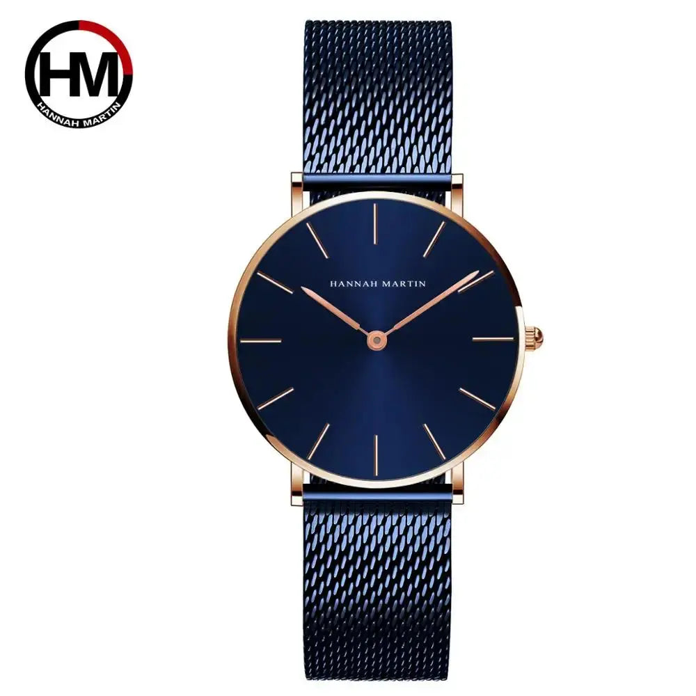 Hannah Martin rose gold watch with blue mesh strap and minimalist dial by Alcom Distribution