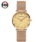 Hannah Martin rose gold watch with mesh band and minimalist beige dial by Alcom Distribution