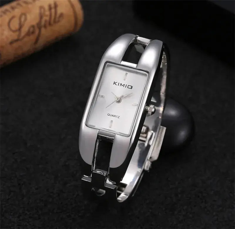 Alcom Distribution luxury women's bracelet watch silver bangle with rectangular white dial and quartz movement
