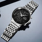 Luxury men's automatic watch with black dial and stainless steel bracelet by Alcom Distribution