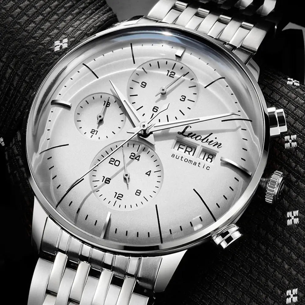 Luxury men's automatic watch with silver dial and stainless steel bracelet by Alcom Distribution
