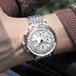 Luxury men's automatic watch by Alcom Distribution with silver metal band and detailed white dial