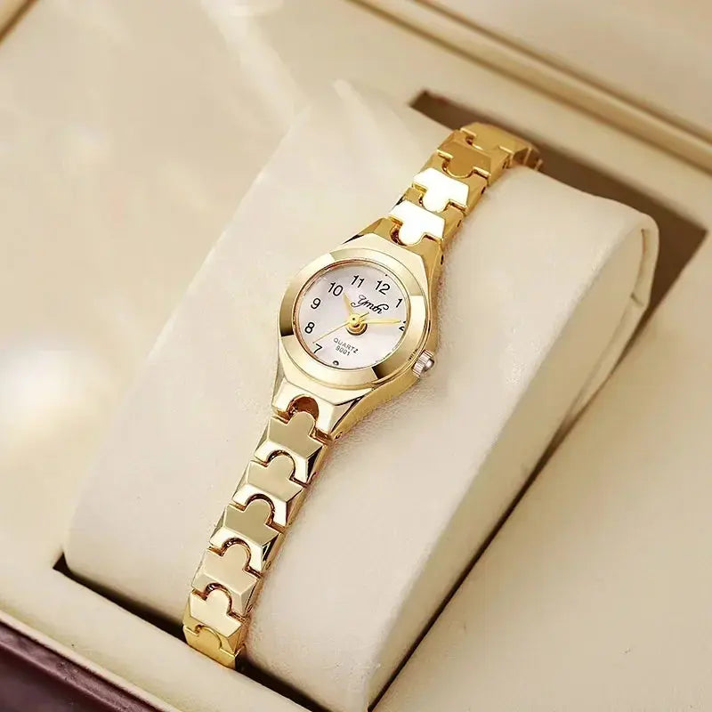 Alcom Distribution rose gold ladies bracelet watch with white dial and slim link bracelet displayed on cushion