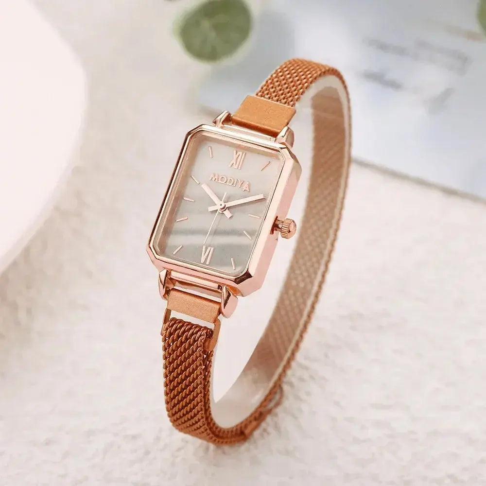 Alcom Distribution rose gold fashion ladies watch with rectangular case mesh band and mother of pearl dial