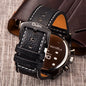 Luxury multi time zone watch with black leather strap and silver buckle by Alcom Distribution