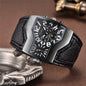 Alcom Distribution men's dual time wristwatch with brushed steel tonneau case, black dial and textured leather strap