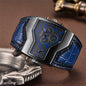 Alcom Distribution men's dual time wristwatch with angular black case and blue crocodile leather strap