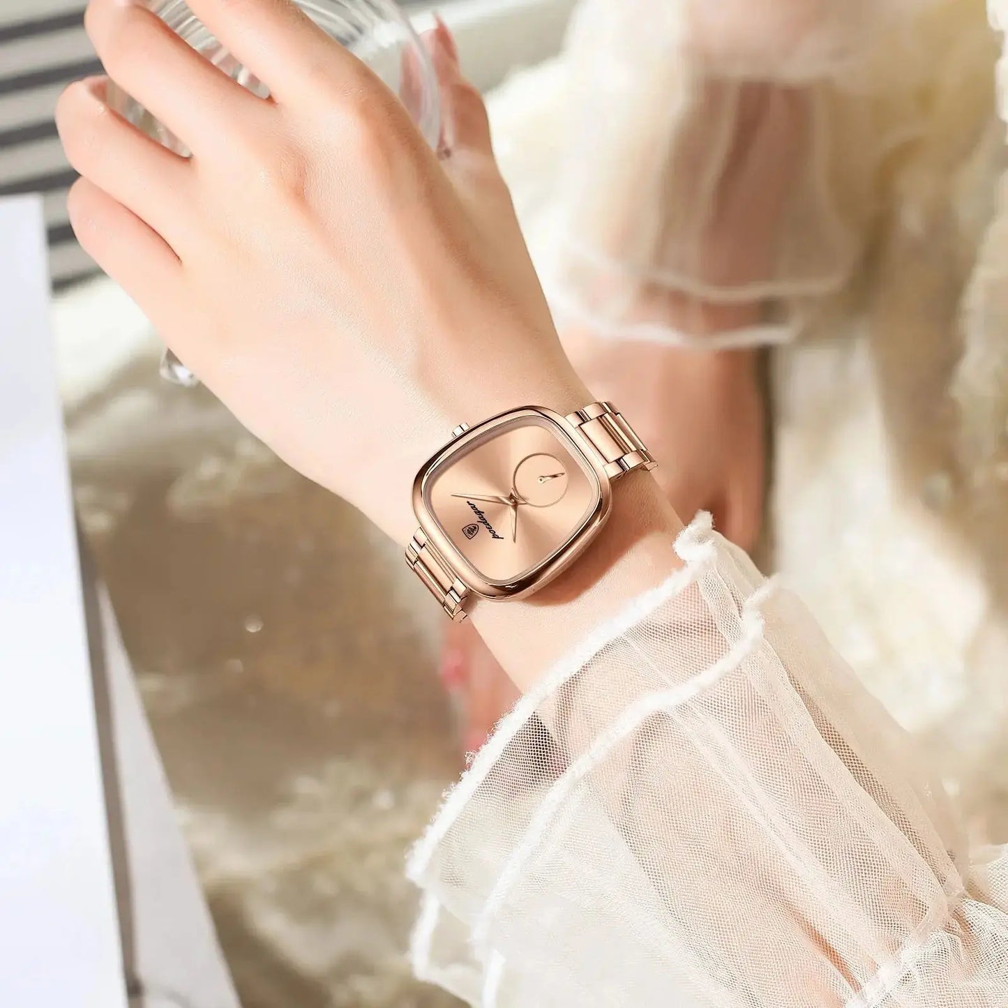 Fashionable quartz timepiece for women with rose gold square dial and metal link band by Alcom Distribution