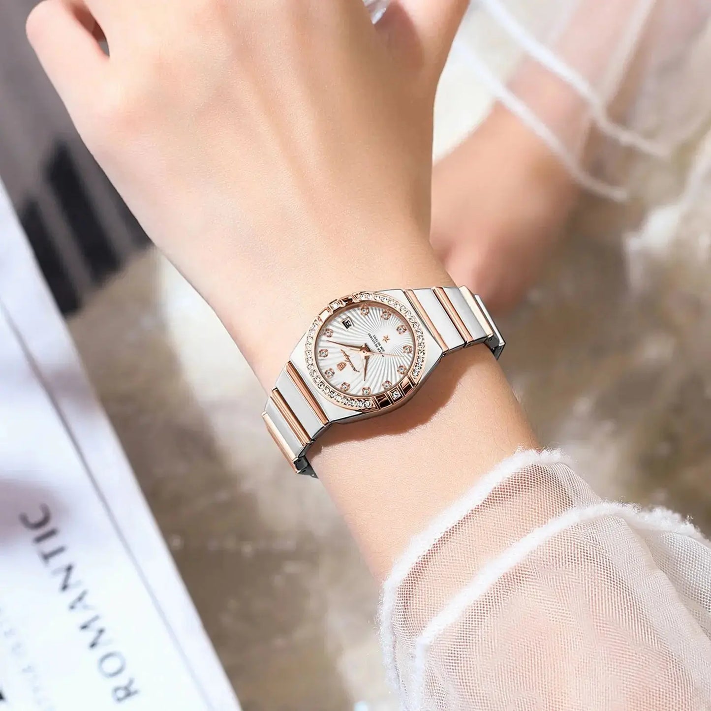 Alcom Distribution luxury quartz watch for women with rose gold and silver tones on wrist