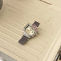 Alcom Distribution hello kitty diamond watch with silver mesh band white dial and pink crystal bow