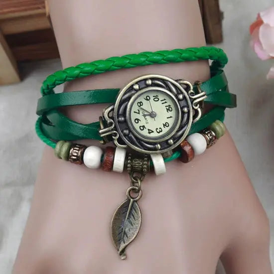 Green Shourui quartz wristwatch for women with braided leather strap and leaf charm