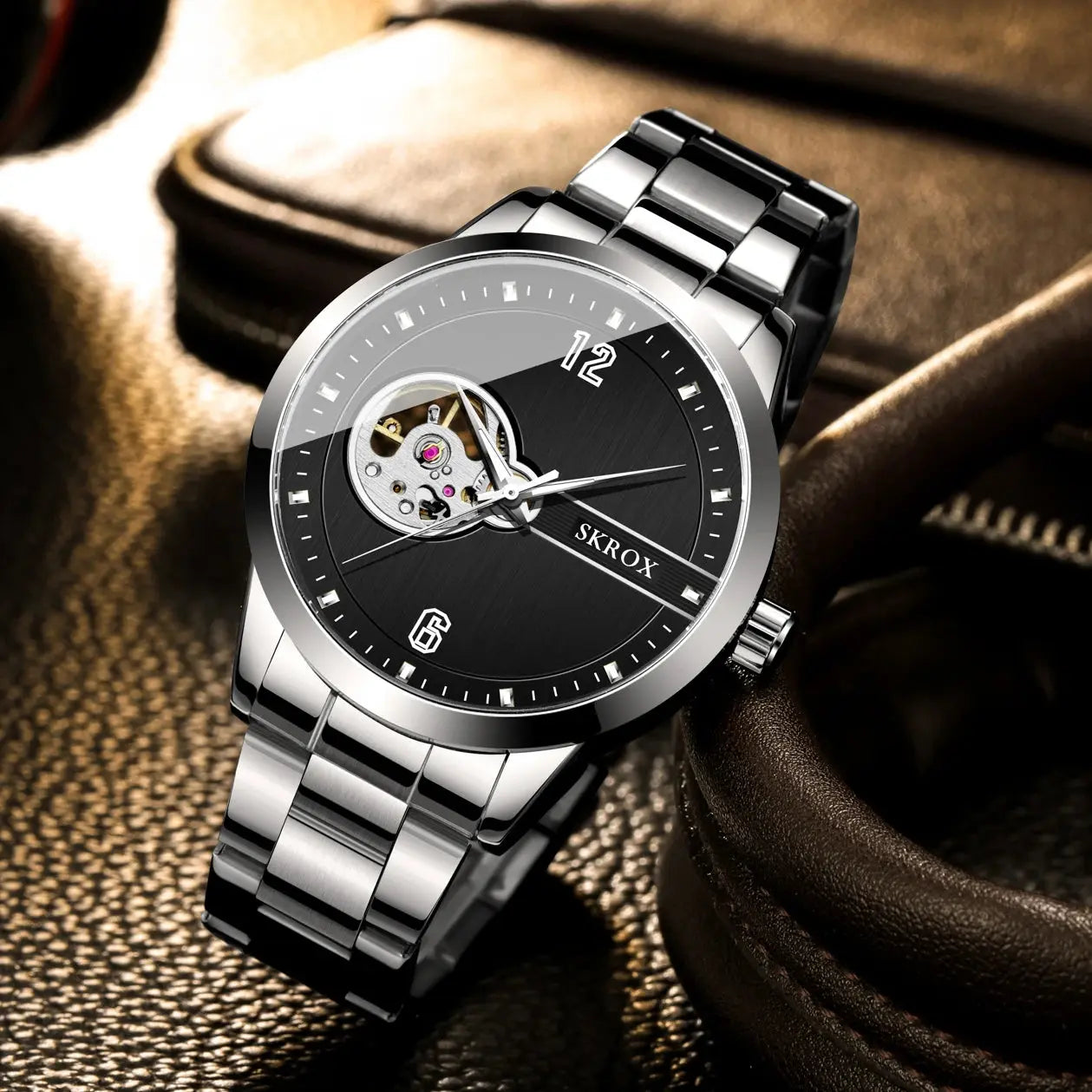 SKROX waterproof automatic watch with silver metal band and black dial showing internal mechanism