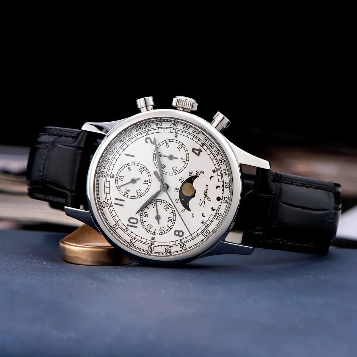 Sugess mechanical chronograph watch with silver case white dial and black leather strap by Alcom Distribution