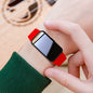 Alcom Distribution tech-savvy fitness wearable with red band on wrist and black rectangular screen