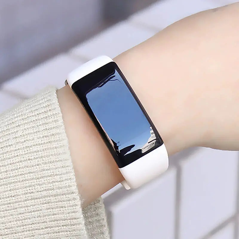 Alcom Distribution tech-savvy fitness wearable smart watch with white band on wrist