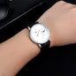 Minimalist men's leather watch with white dial and black strap by Alcom Distribution