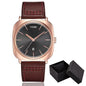 Minimalist men's leather watch with black dial and rose gold case by Alcom Distribution with brown stitched strap