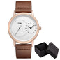 Minimalist men's leather watch by Alcom Distribution with brown strap and dual time dials